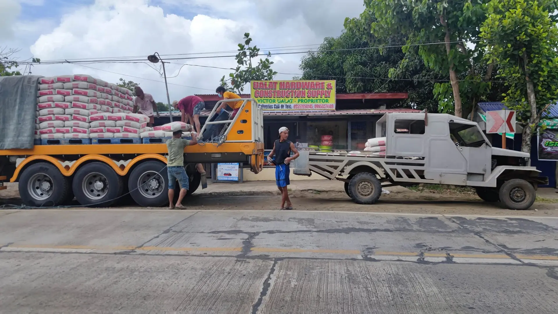 Cement delivery outside Ualat Hardware in Echague